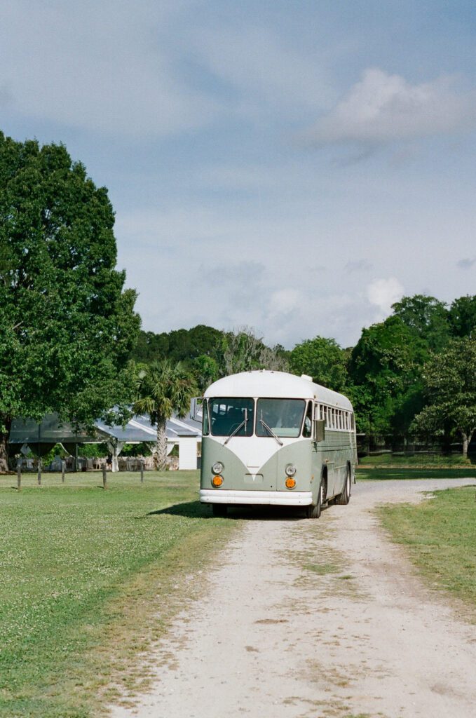 Old VW bus dropping off wedding guests 