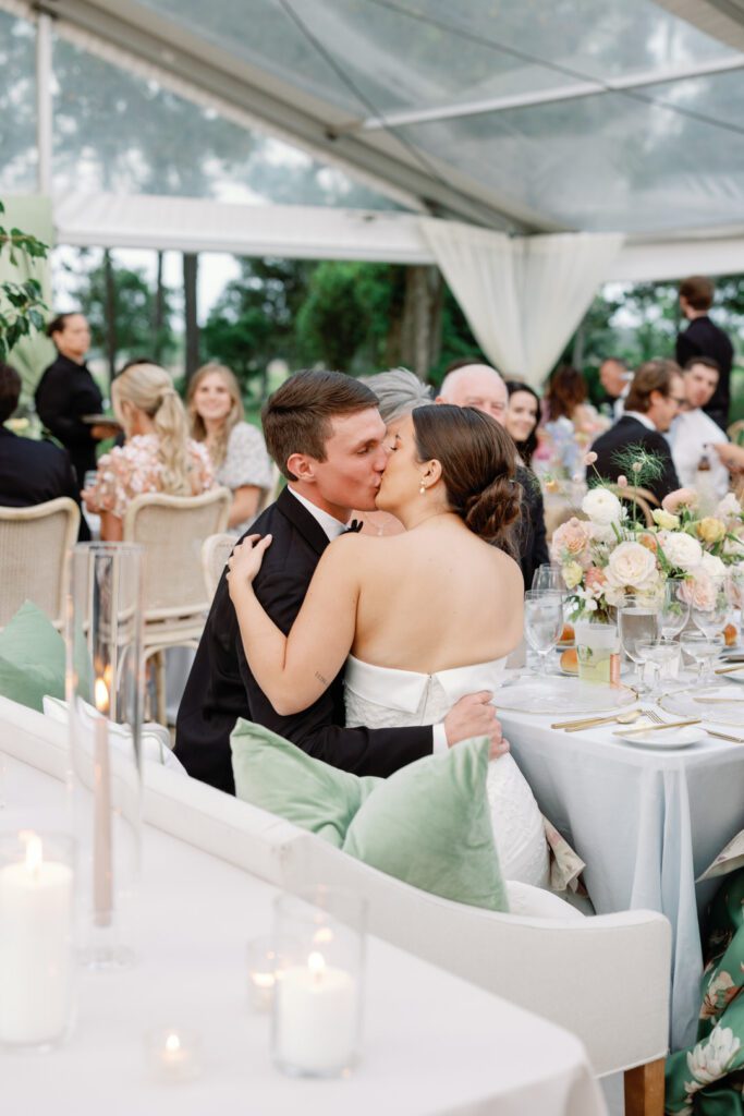 bride and groom kissing