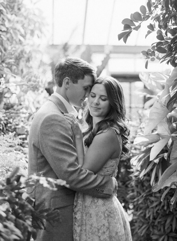 Black and white of couple in the conservatory at The Biltmore Estate