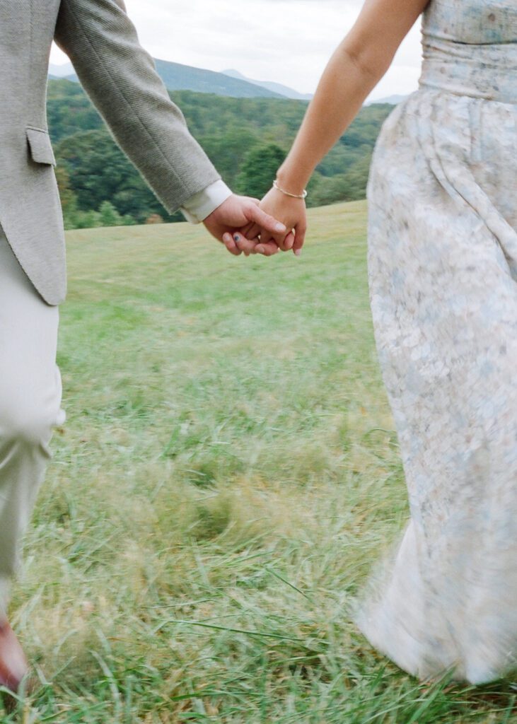 Couple holding hands