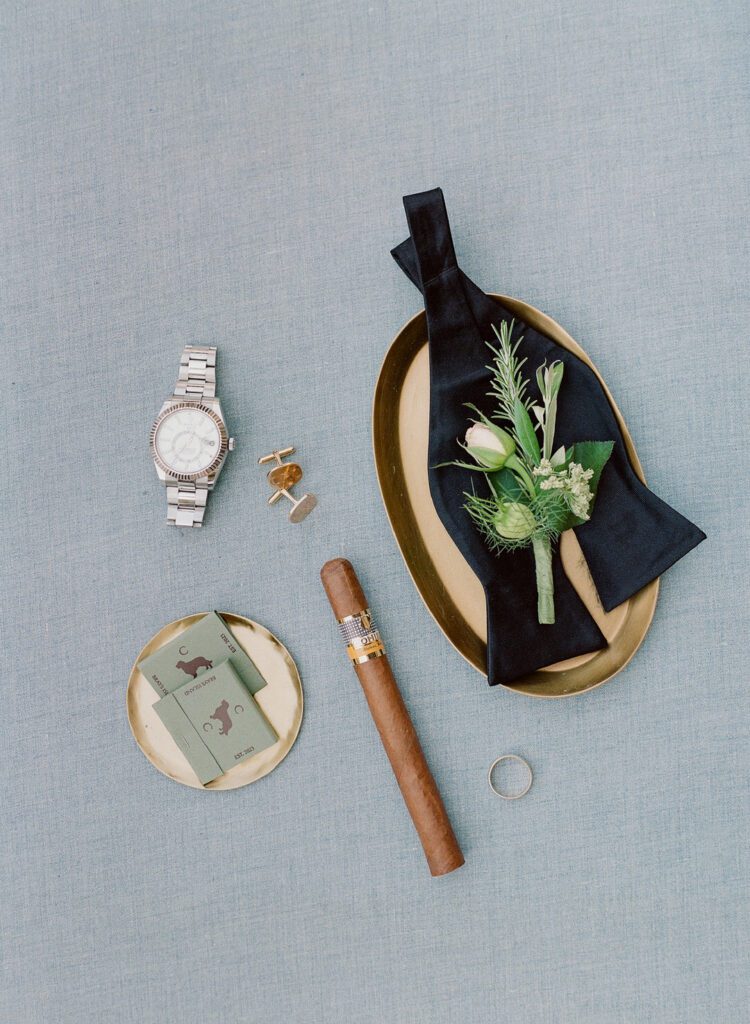 groom's watch cigar and tie 