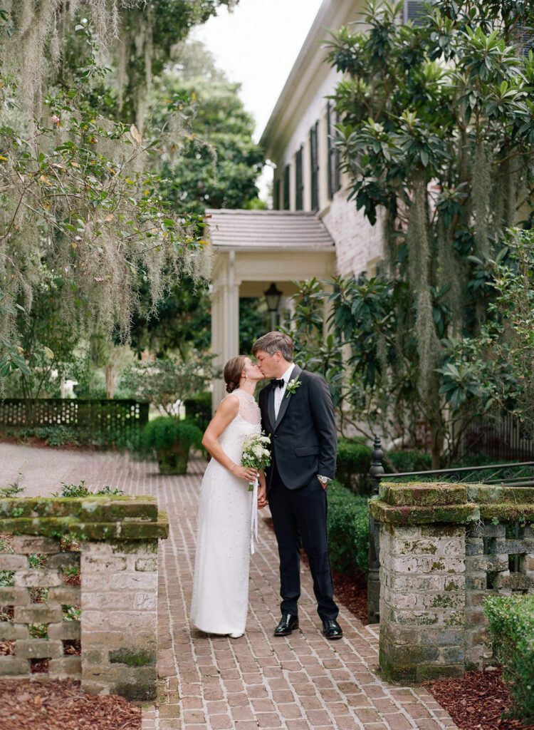 bride and groom kissing 