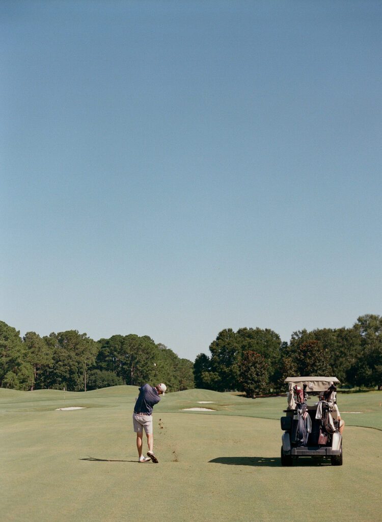 groom playing golf 