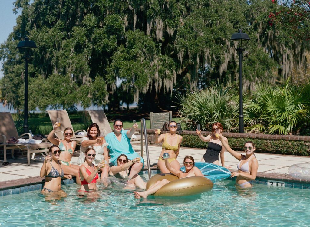 bridesmaids with bride swimming 