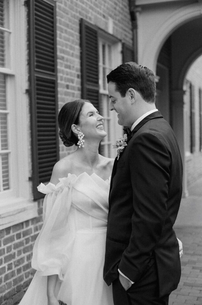 Black and White of Bride and Groom Laughing