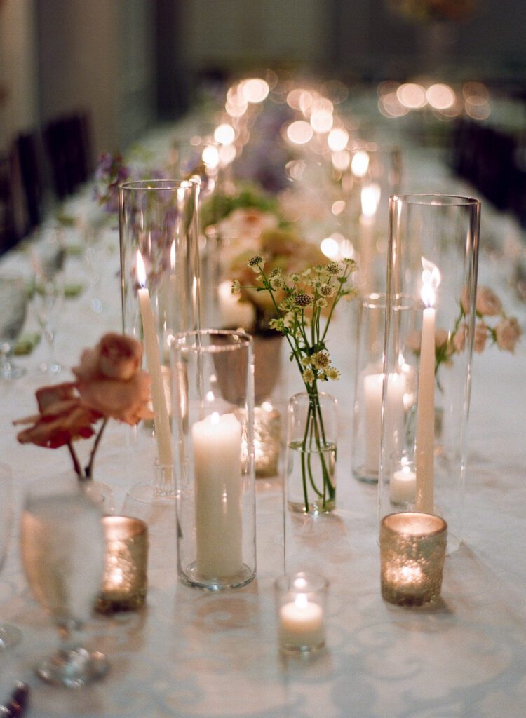 Candles and flower on wedding reception table