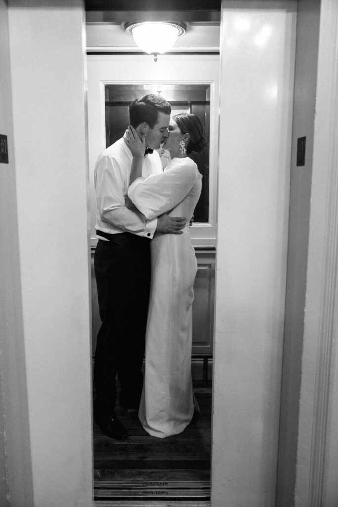 Black and White of Bride and Groom in elevator