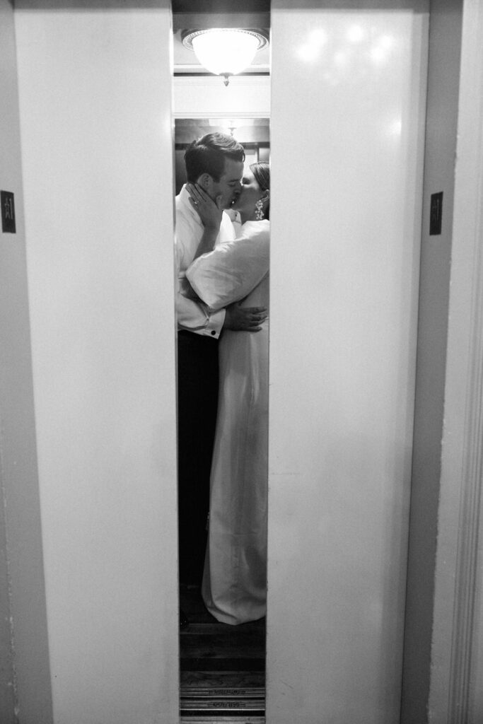 Black and White of Bride and Groom in elevator