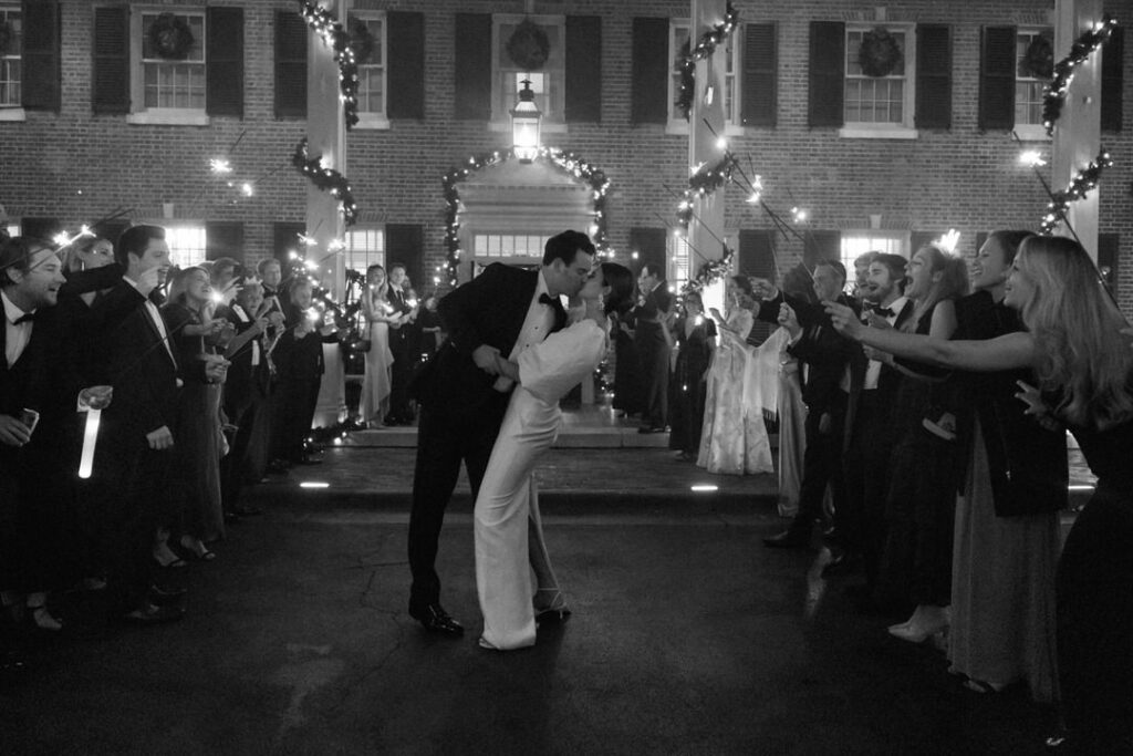 Black and White of Bride and Groom at Sparkler exit