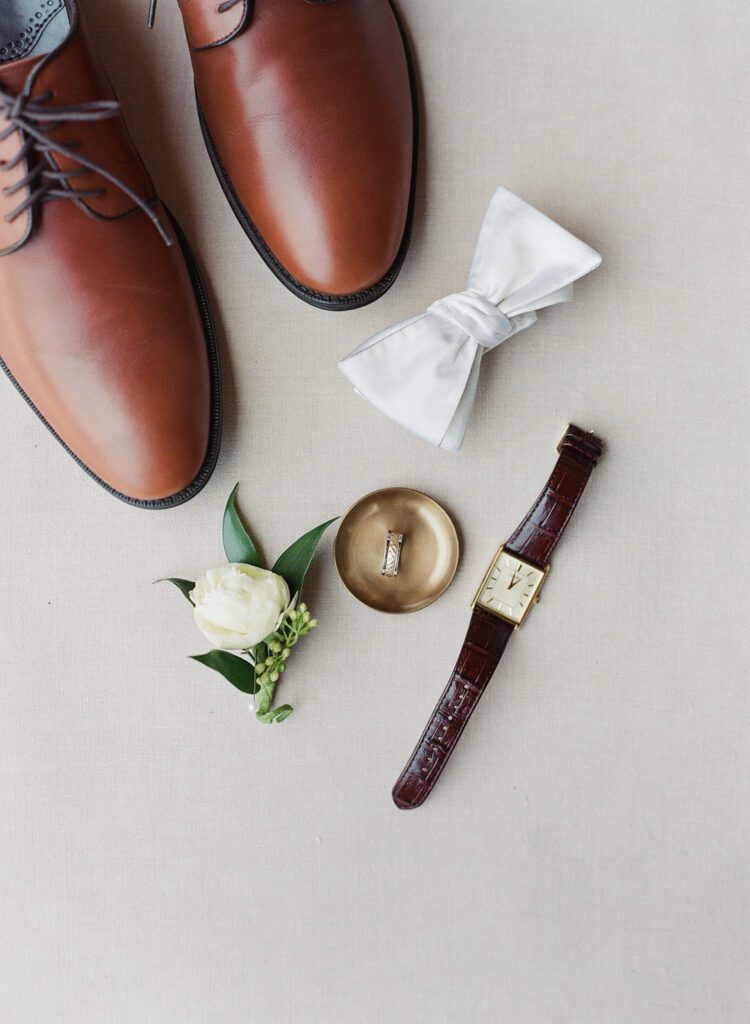 grooms shoes ring watch and bowtie