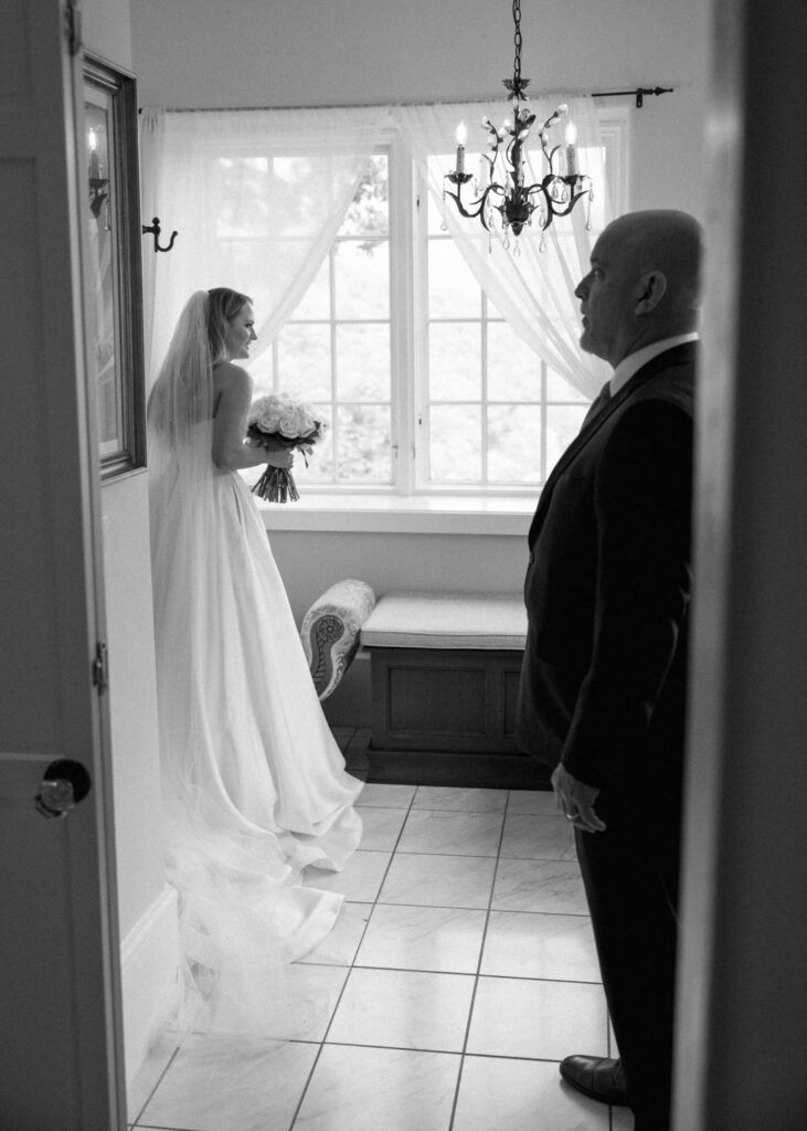 black and white of bride dad before ceremony