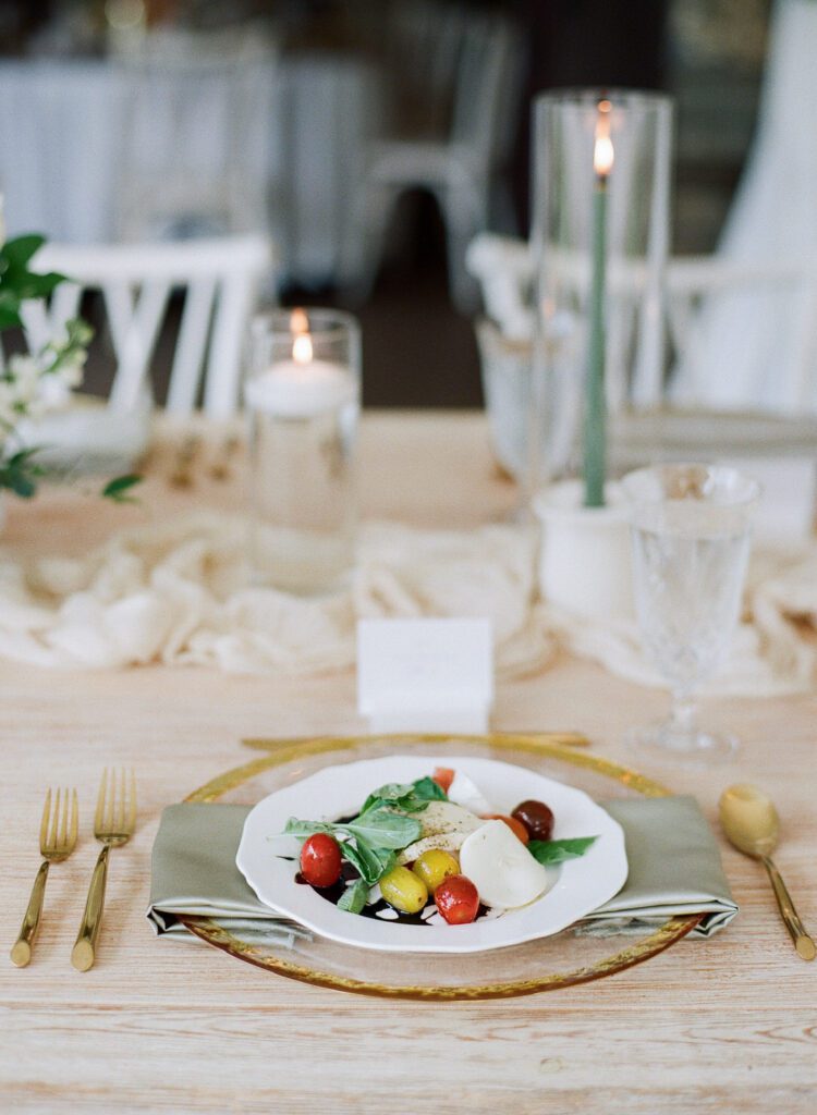 wedding reception table with salad