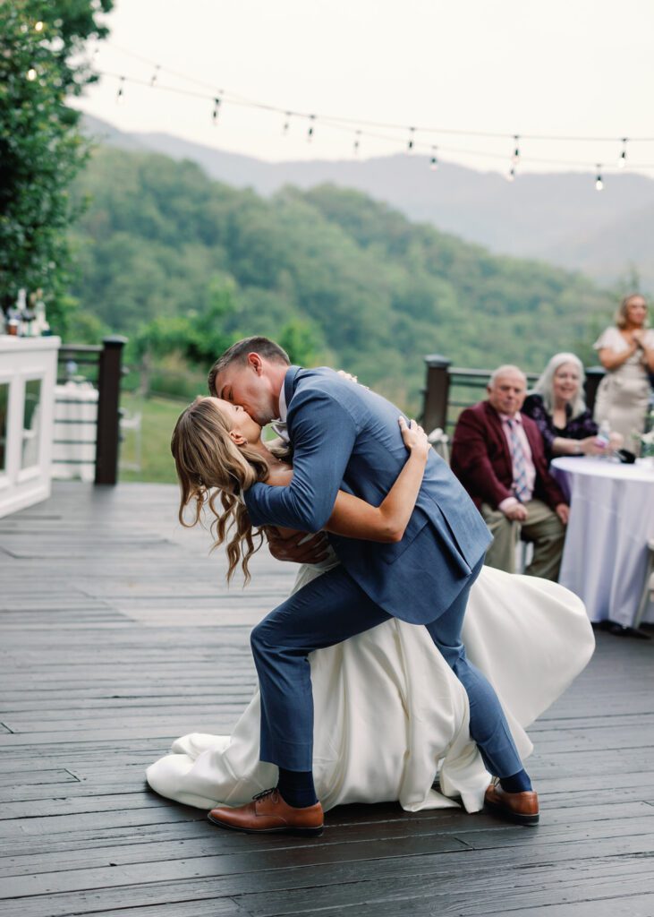 bride and groom first dance kiss