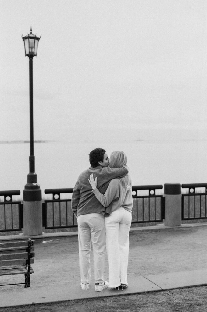 black and white of couple kissing