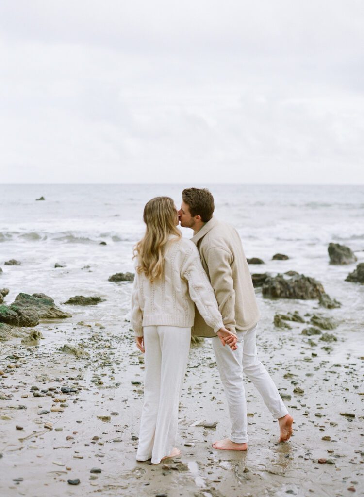 couple kissing on El Matador Beach