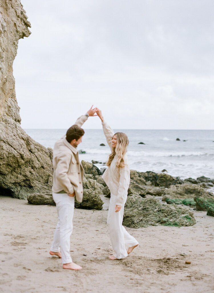 couple dancing on the beach