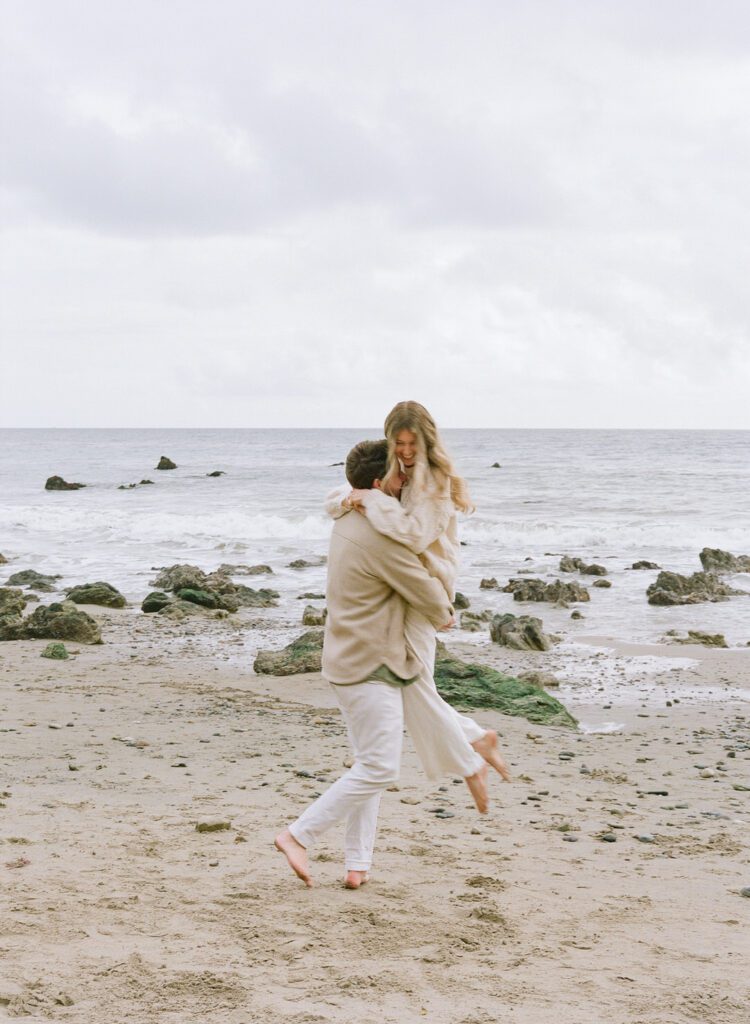 El Matador Beach Photos couple hugging on beach