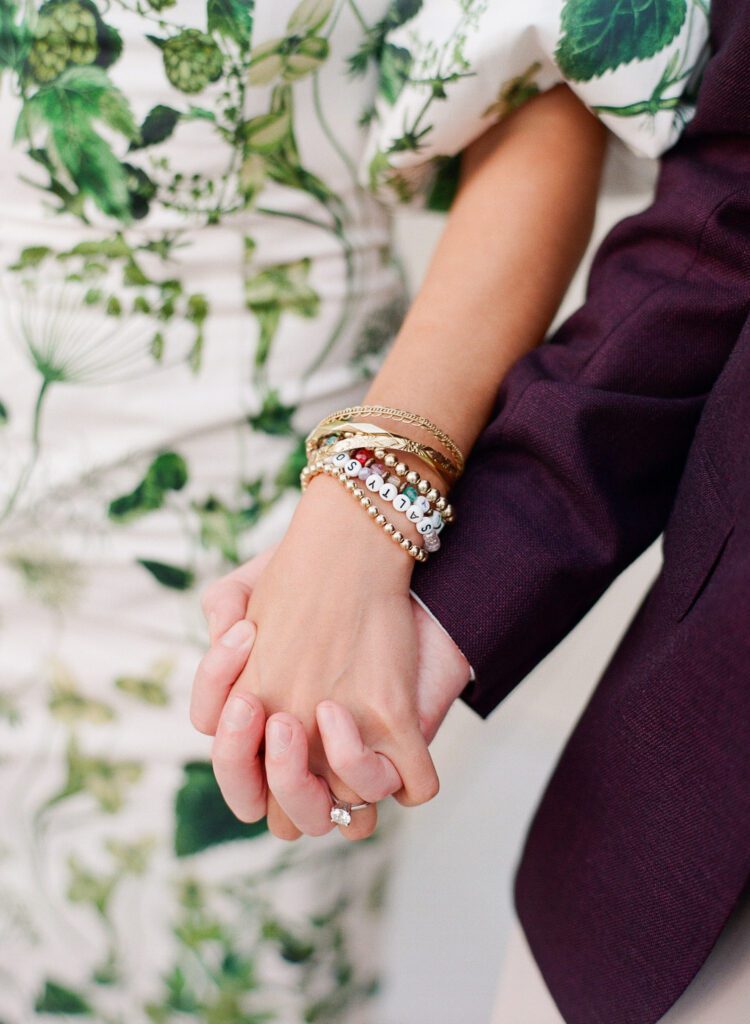 bride and groom holding hands 