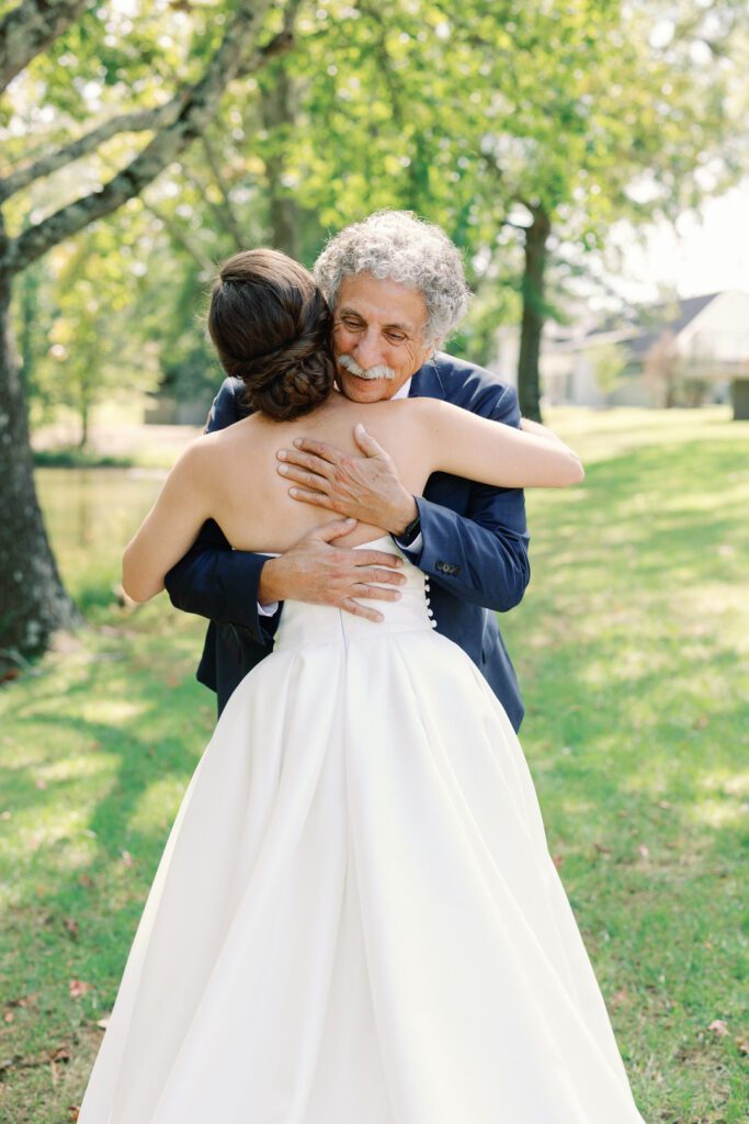 bride hugging her dad