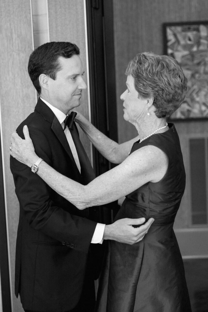 black and white of groom and mom 