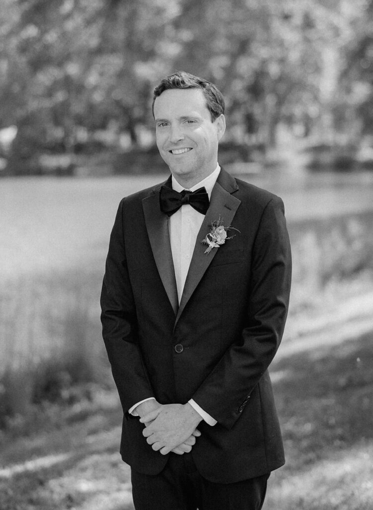 black and white of groom 