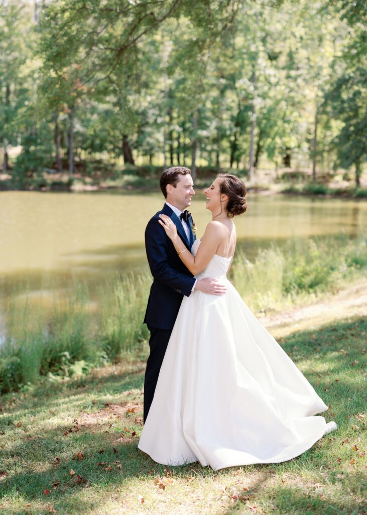 bride and groom laughing 