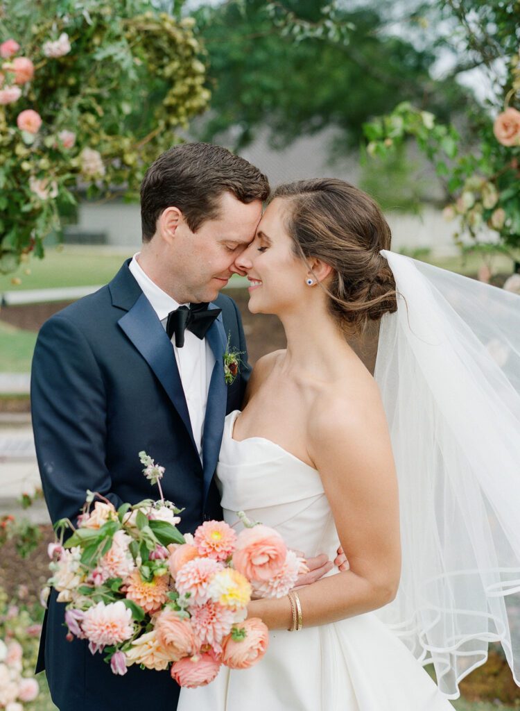 bride and groom nose to nose 