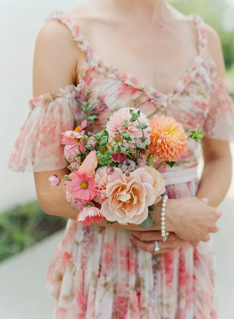 bridesmaid holding bouquet 