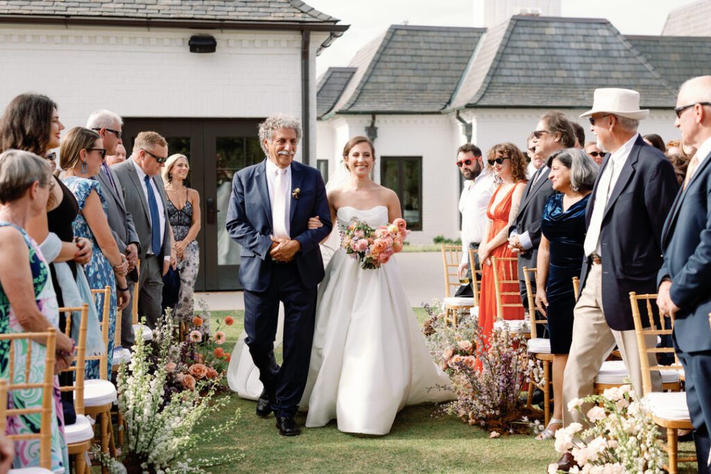 bride and her dad walking down aisle 