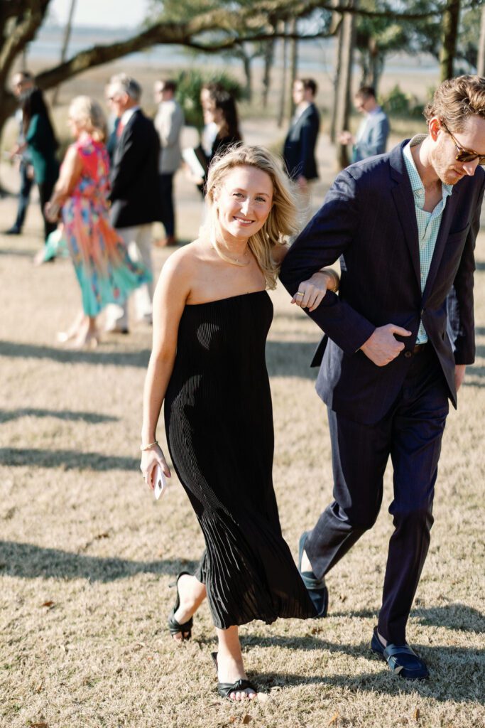 bridesmaid and groomsmen walking