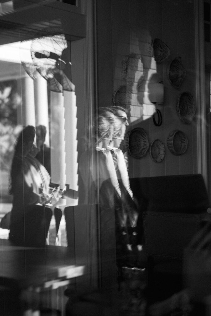 black and white reflection in window