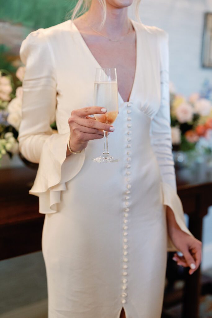 bride holding champagne