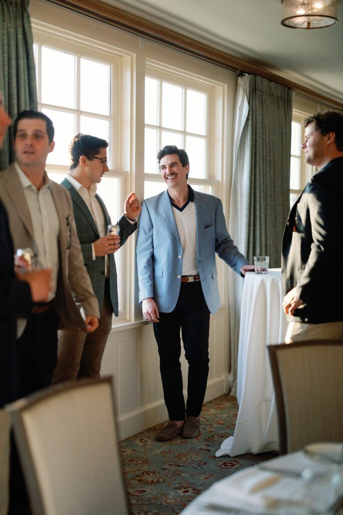 groomsmen laughing at Kiawah Island Ocean Course