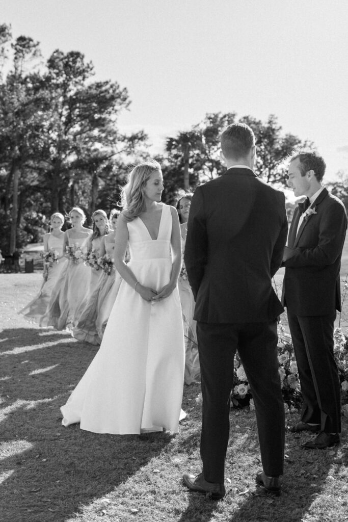 black and white of bride and groom wedding ceremony