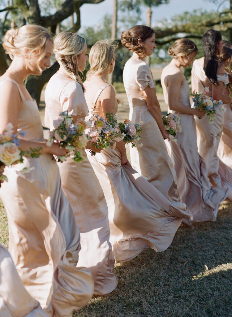 bridesmaids dresses blowing in the wind