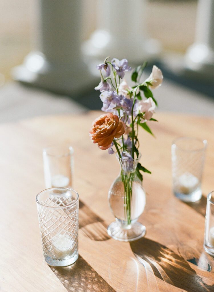 flowers and candles on table