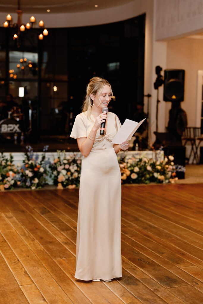 maid of honor giving toast at reception