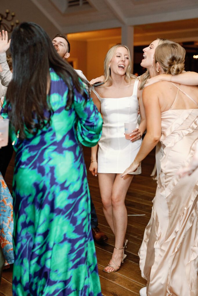 bride singing with friends