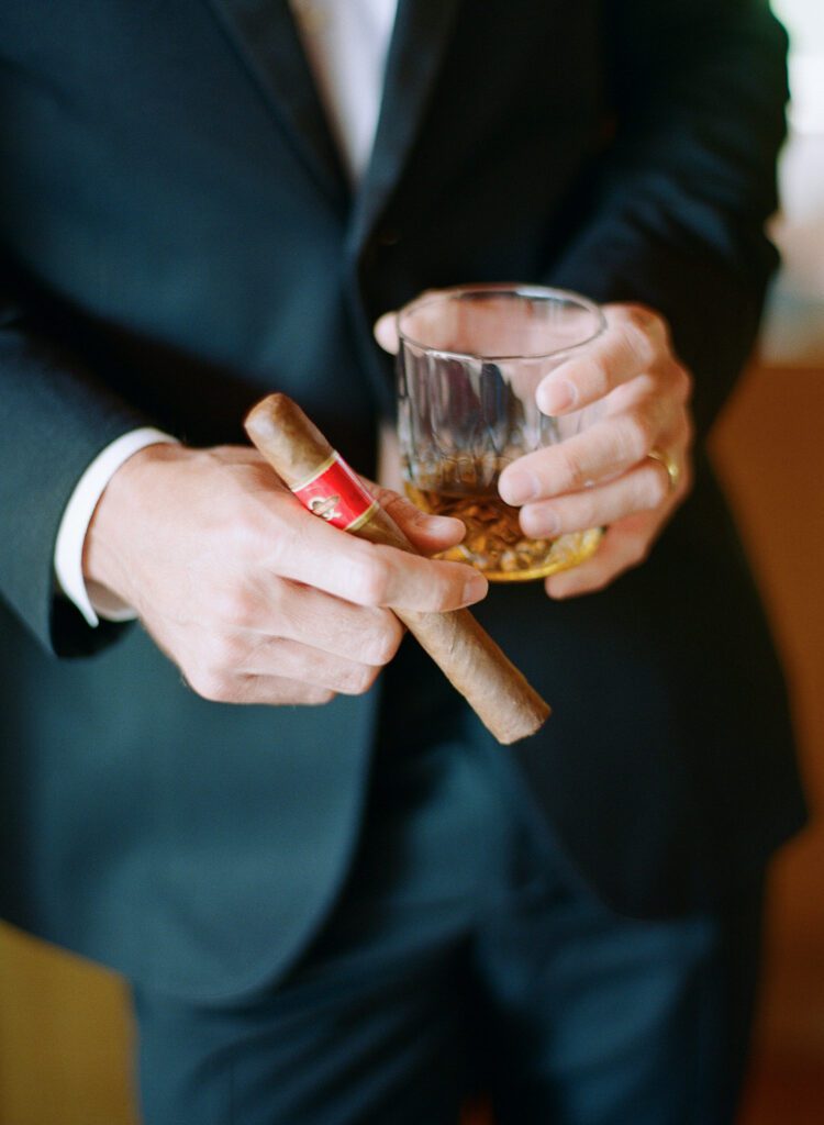 Groom Holding Cigar 