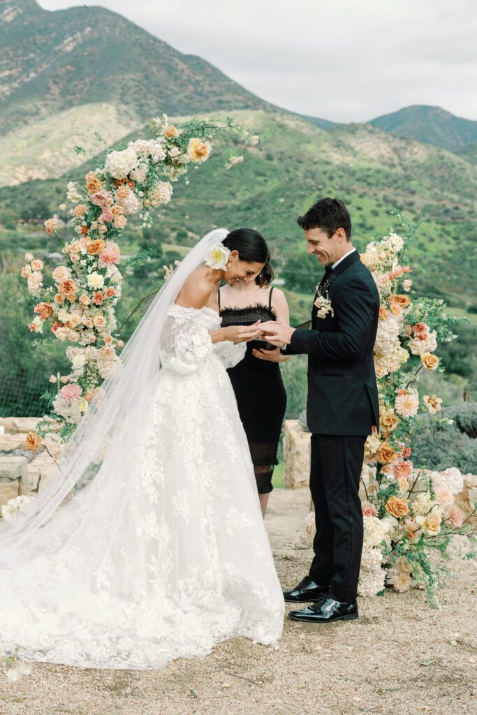 Bride and Groom Ceremony Exchanging Rings 