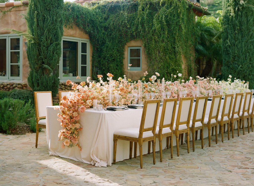 Wedding Reception Table with flowers and place settings 