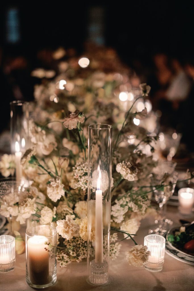 Wedding Reception table with flowers and candles 