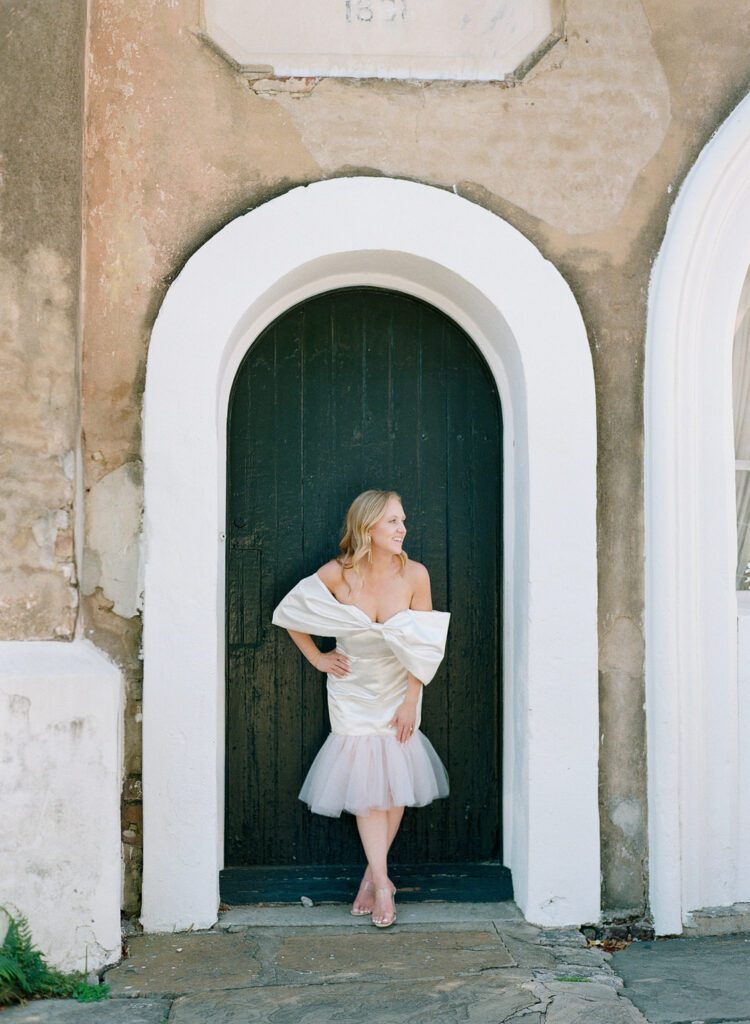 bride in archway looking down the road