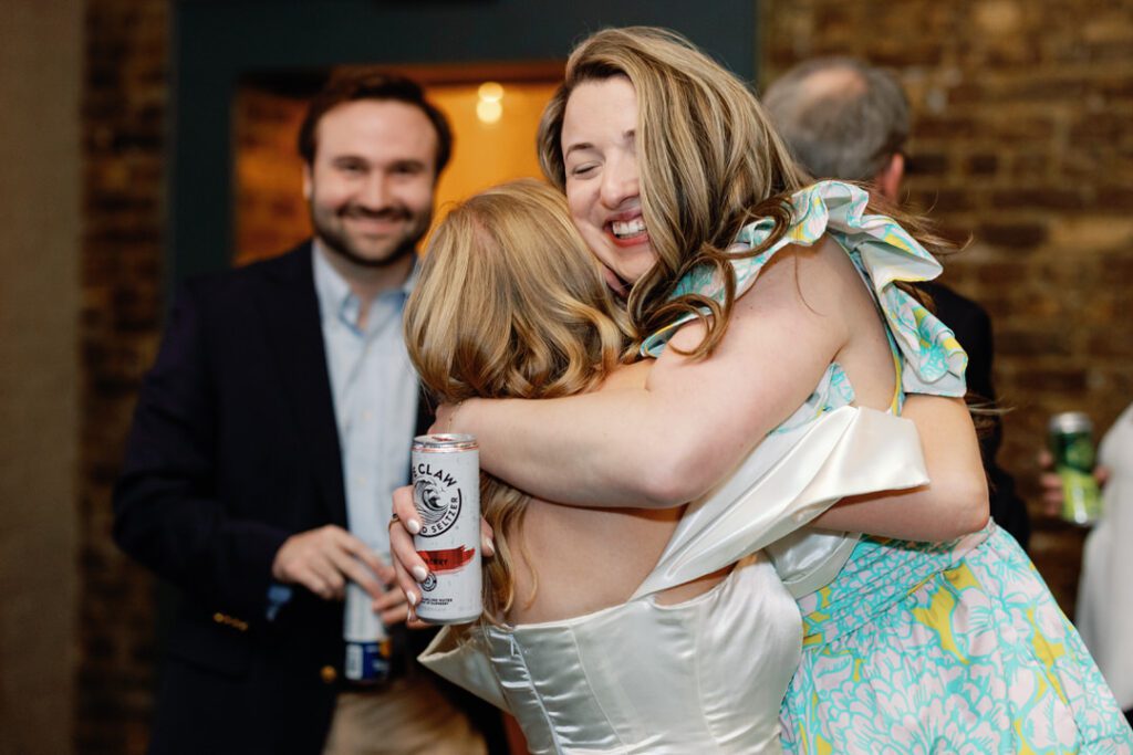 bride hugging friend