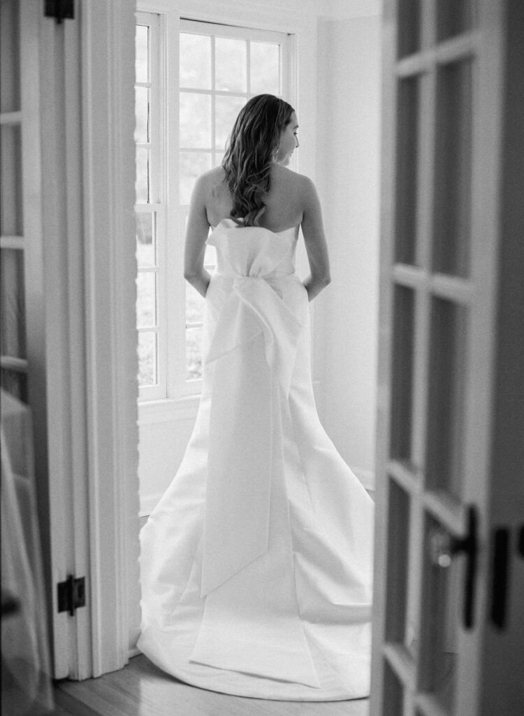 Black and white of the bride getting ready