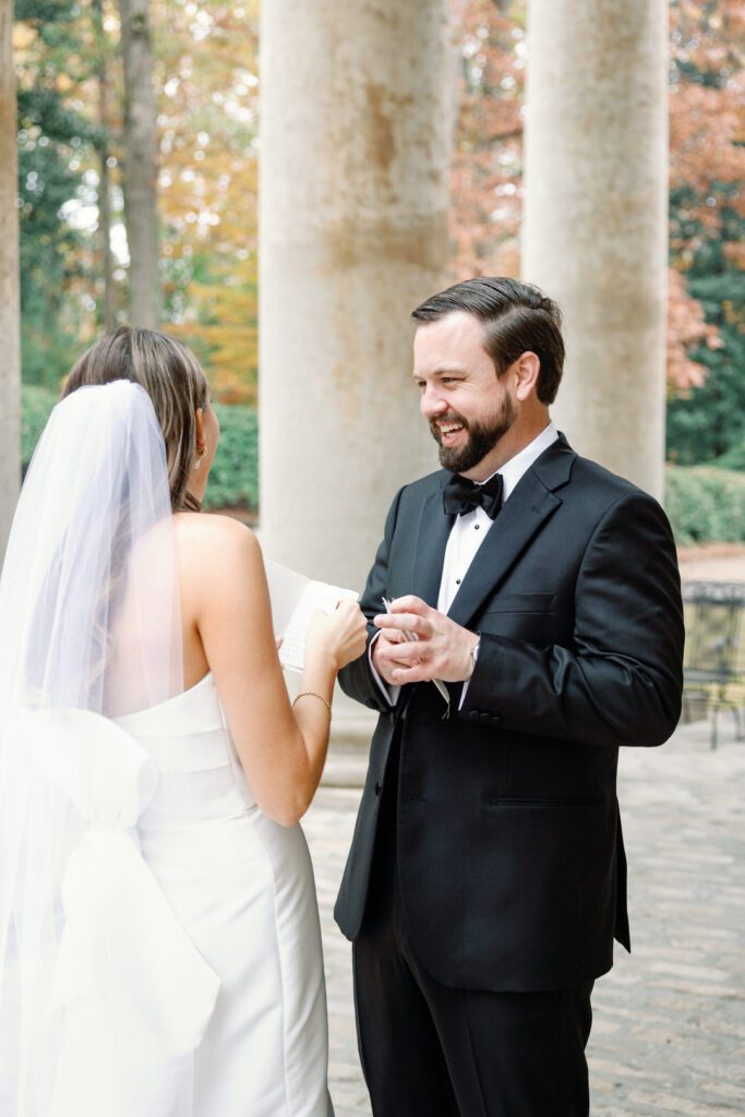 Groom Laughing with Bride