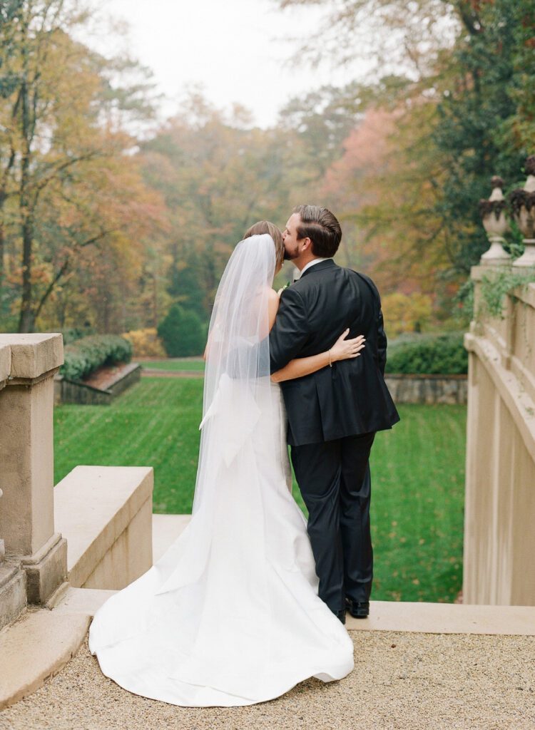 groom kissing bride