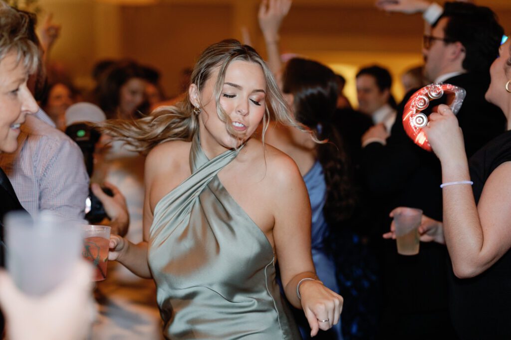 Maid of Honor dancing at Swan House Wedding Reception