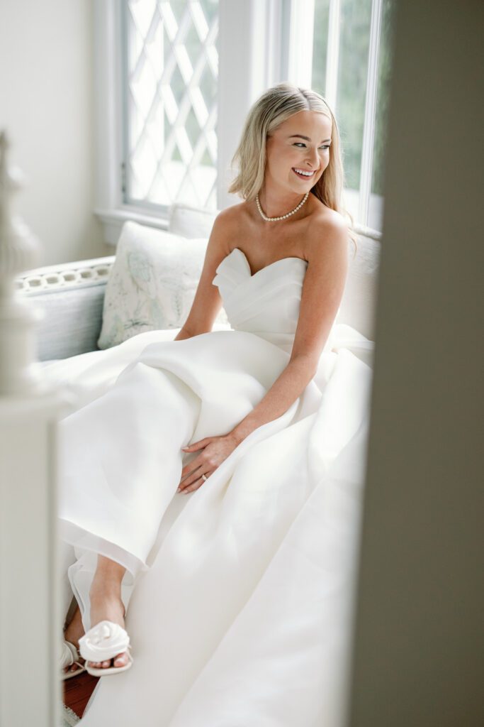 bride smiling looking over shoulder