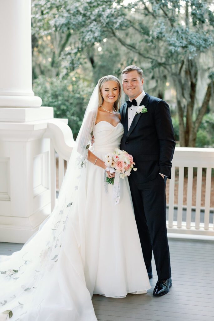 bride and groom on porch